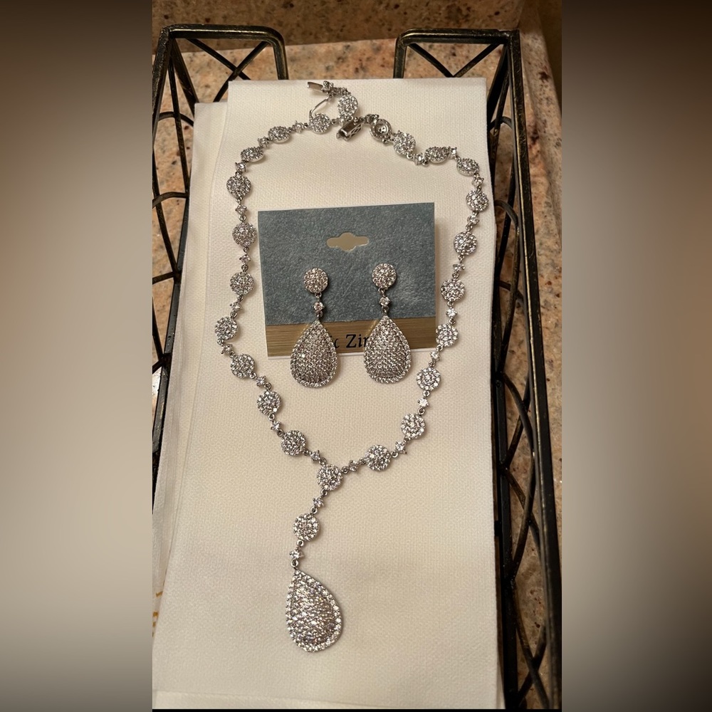 Matching cubic zirconia necklace & earrings set.